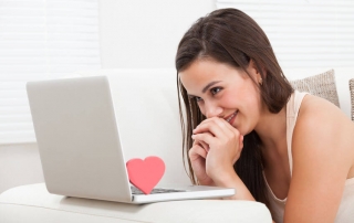 woman reading an online dating profile